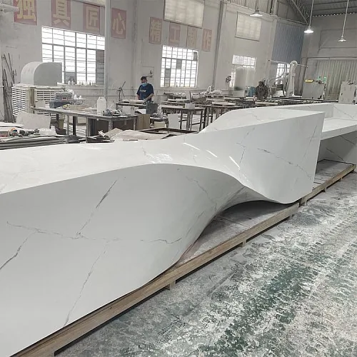 Sculpted white solid surface counter during fabrication at ESHINE